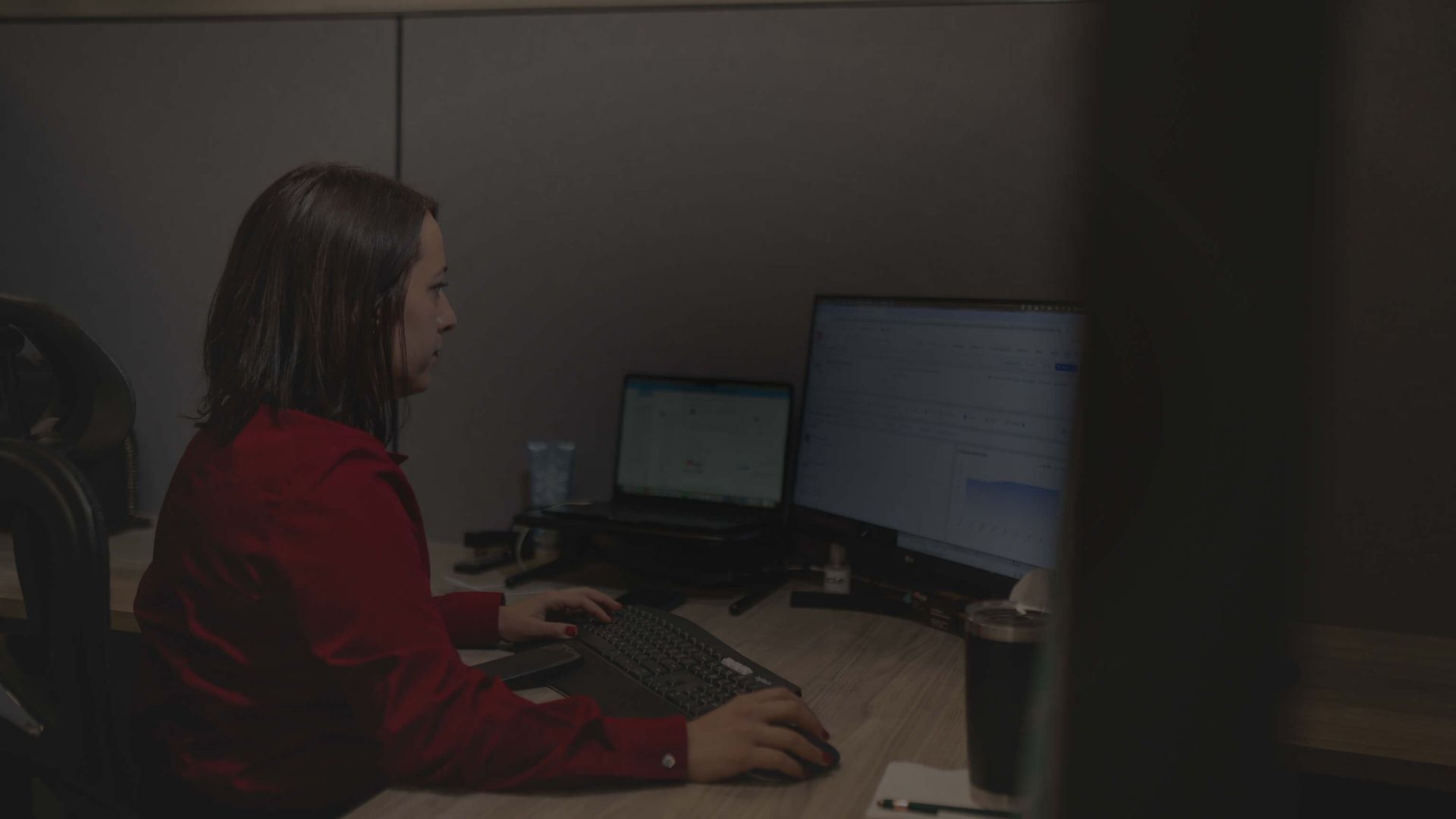 Rose Pallet employee working on computer